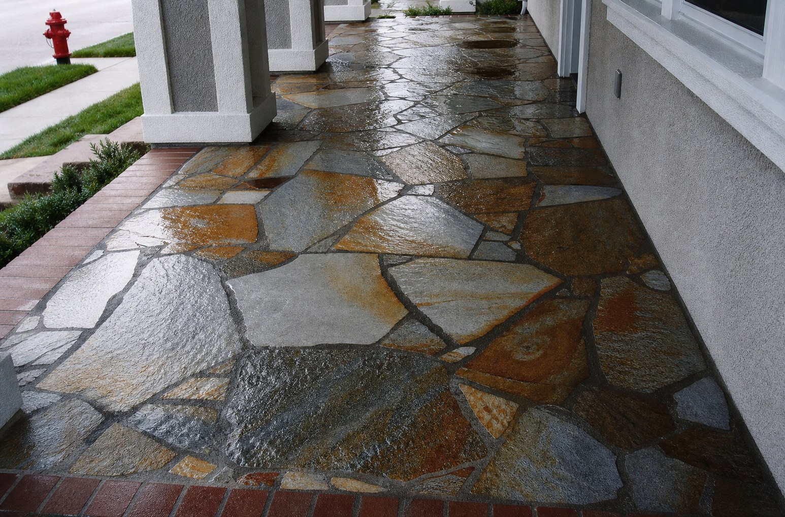Multicolor flagstone porch with professional sealer finish Portland OR